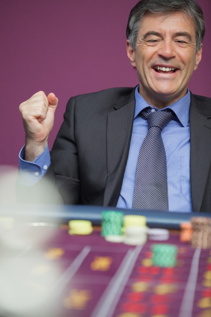 Live dealer table during concurrent volleyball match broadcast